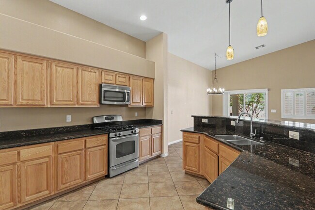 Building Photo - Immaculate 5-Bed, 3-Bath Entertainer’s Home on Over a Quarter Acre in Gated Riverwalk Ranch Manor...