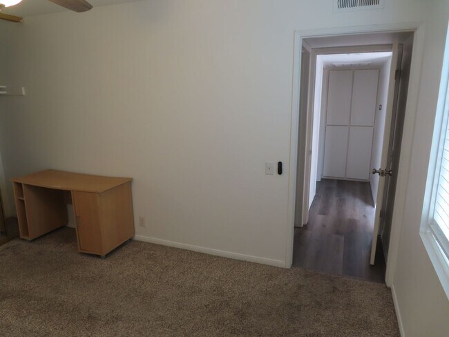 Building Photo - Partially Furnished Two Bedroom Condo in College Area