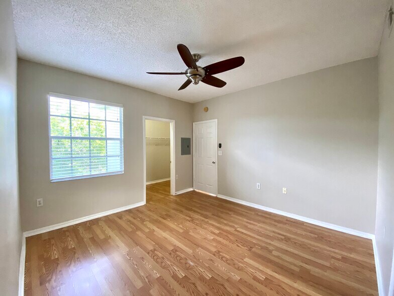 Bedroom with walk in closet - 5510 Bentgrass Dr