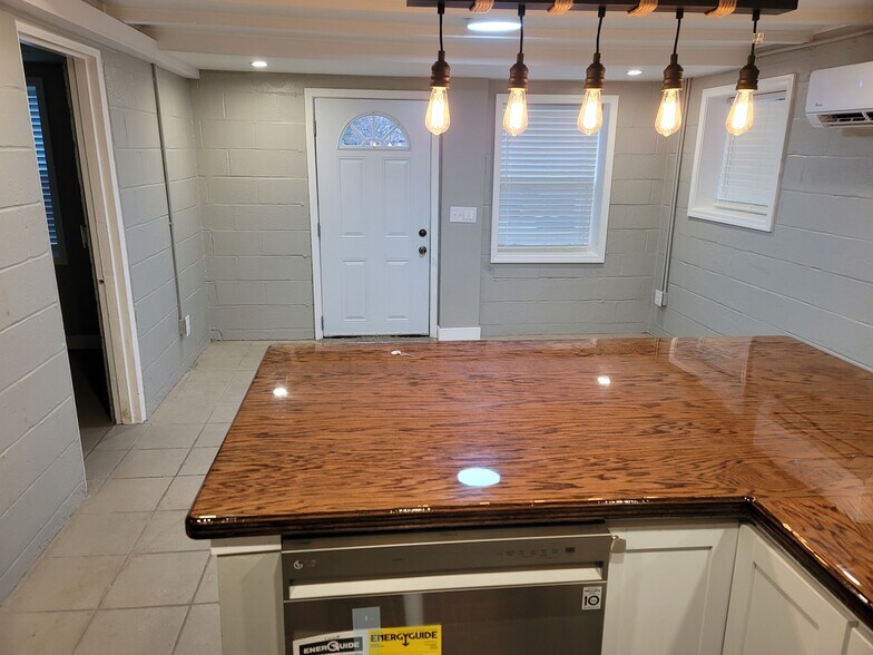View of front room/entry area, from kitchen - 329 1/2 S Hocker Ave
