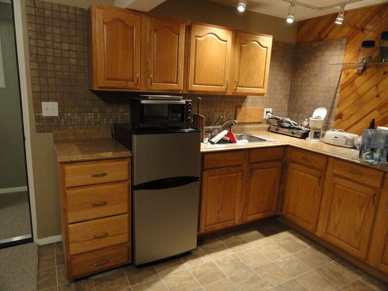 Basement kitchenette - 9705 W 97th Ave