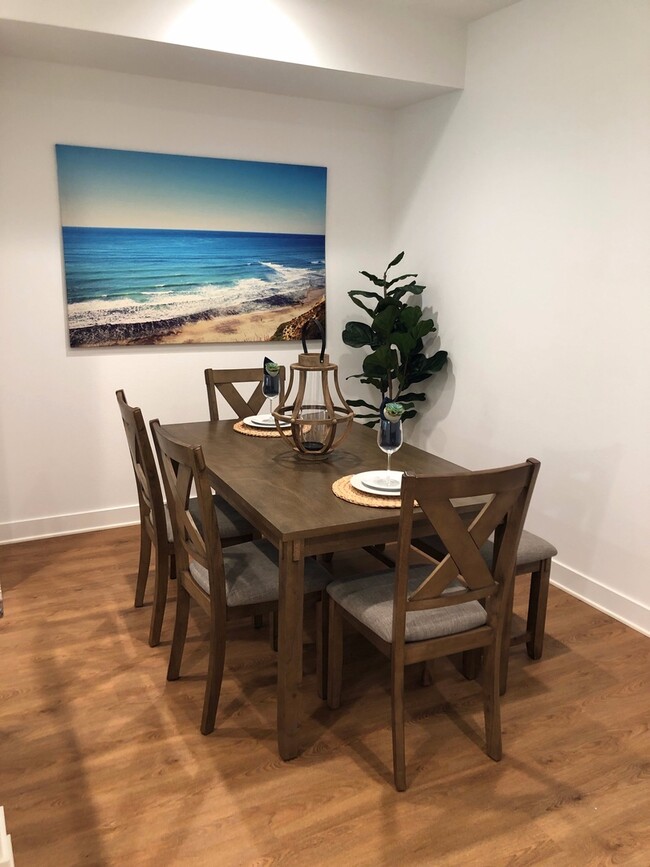 Building Photo - Gorgeous 4 bed/4 bath w/2 car garage in new community w/pool less than 1 mile to the beach!