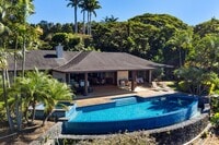 Building Photo - Luxury furnished 4 bedroom 3 bathroom with pool, spa, and outdoor showers