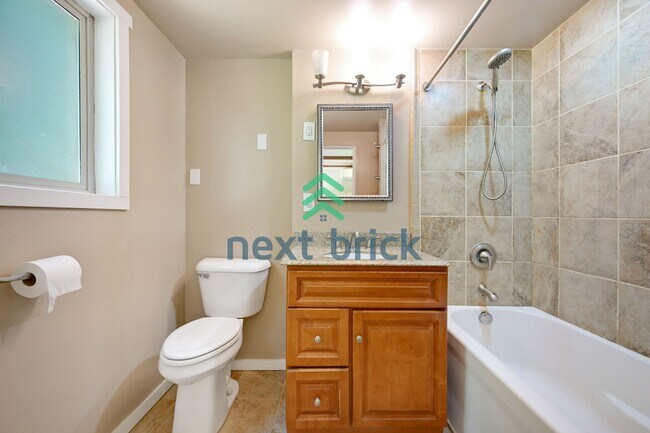Building Photo - Discover Spacious Comfort for multi-generational living: 4-Bedroom Home with additional kitchenet...