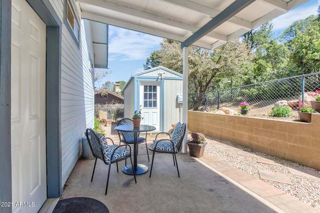 Back Patio w/ 7*20 Storage unit - 1003 N Matterhorn Rd