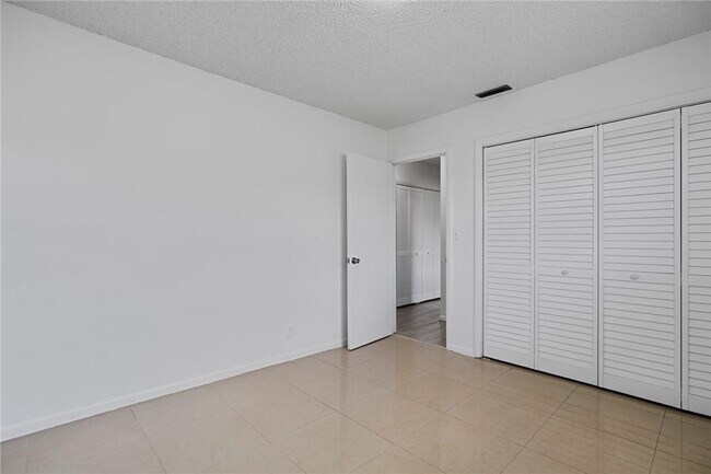 Building Photo - 3100 Coral Springs Dr