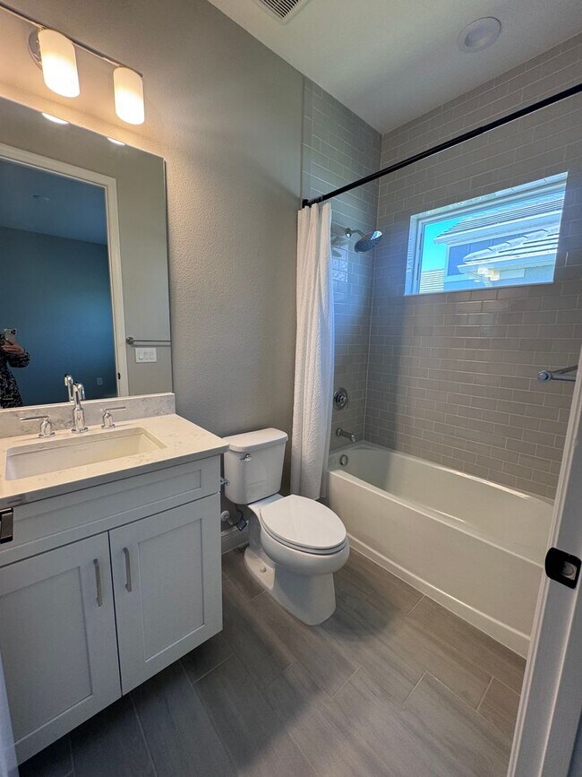 Building Photo - New Construction in Grand Park-4 Bedrooms and 4 Bathrooms with a Den and a Loft! No deposit for q...