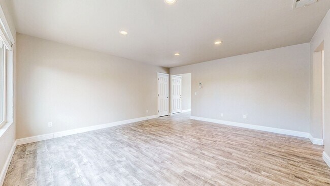 Building Photo - Bright 2 Bedroom, 1 Bathroom Single Family Home! Attached 2 Car Garage and Landscaping Included!