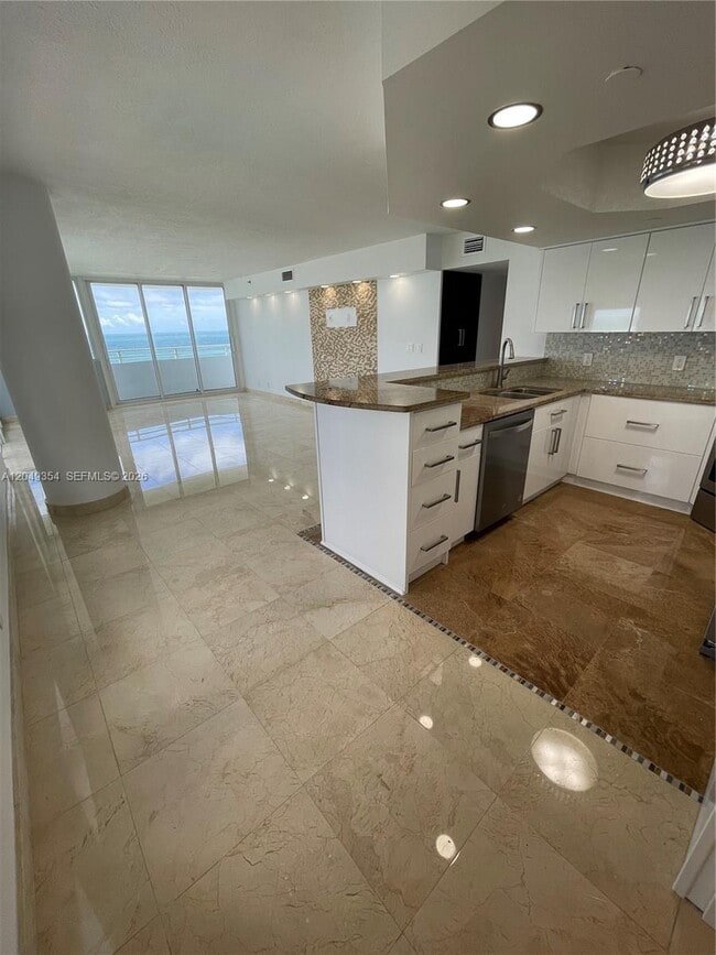 Building Photo - 8911 Collins Ave