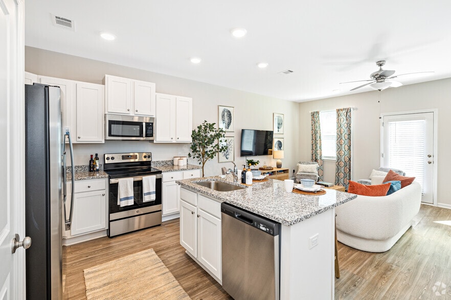 3BR, 2.5BA - 1,419 SF Kitchen - Covey Homes Grand Lagoon