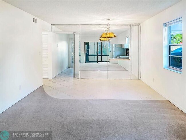 Building Photo - 6090 N Sabal Palm Blvd