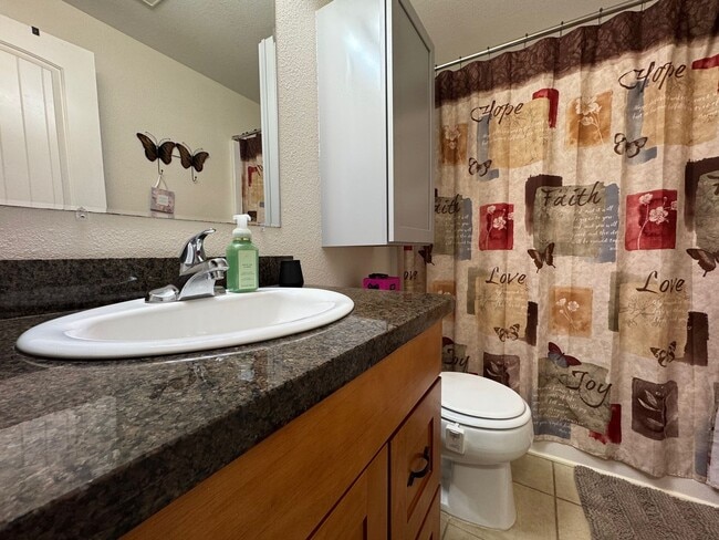 Building Photo - Spacious 4-Bedroom Home in Gated Clearwood...