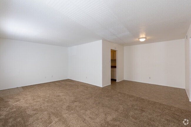 Living and dining room - American Village Apartments