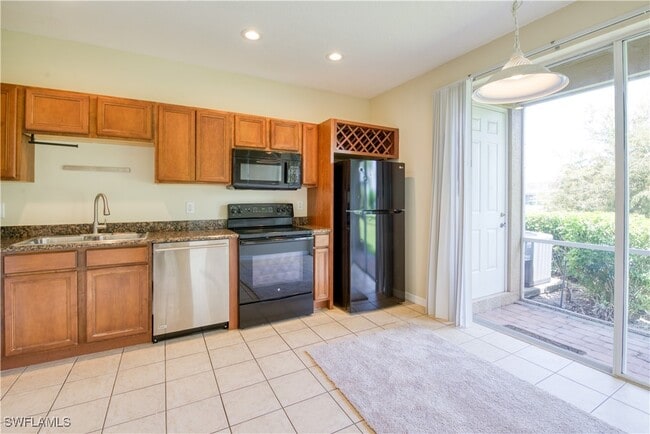 Building Photo - 9774 Roundstone Cir