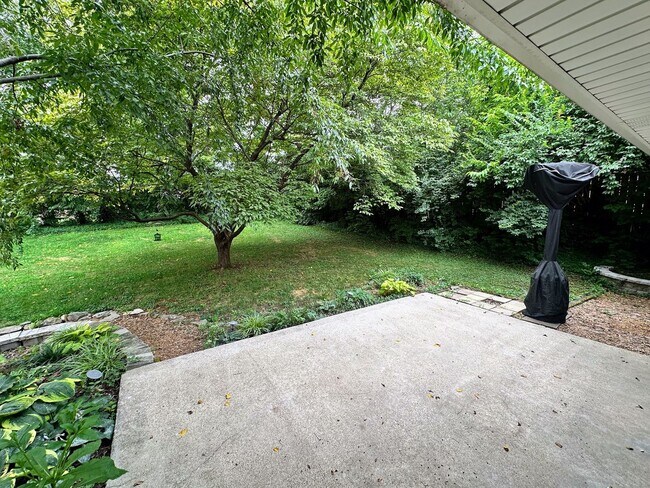 Building Photo - AVAILABLE NOW! Spacious 4 BR, 2 Bath House! Wood Floors, Attached Garage, W/D Included