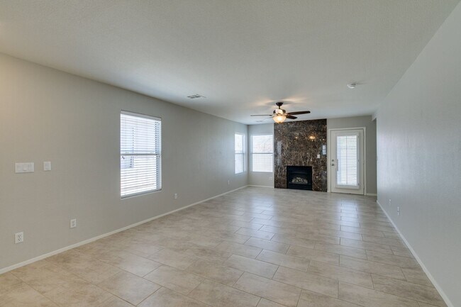 Building Photo - 2 bedroom + Den- Upgraded Flooring ready for immediate move in