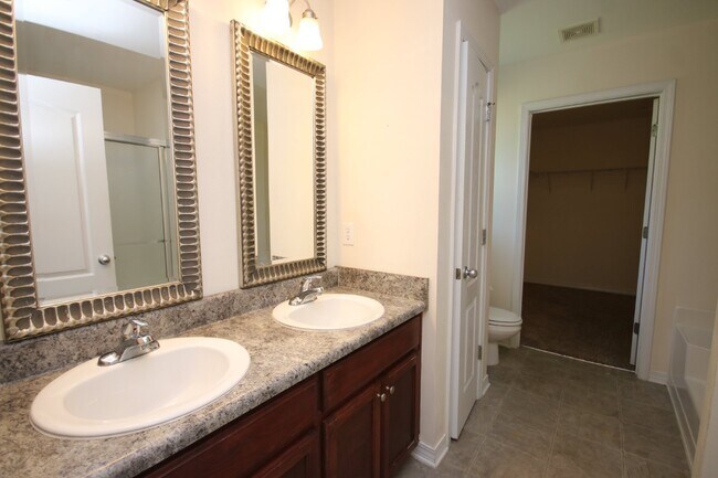 Building Photo - Spacious 4BR Home in Robin's Ridge with Soaring Ceilings, Guest Suite & Two-Car Garage