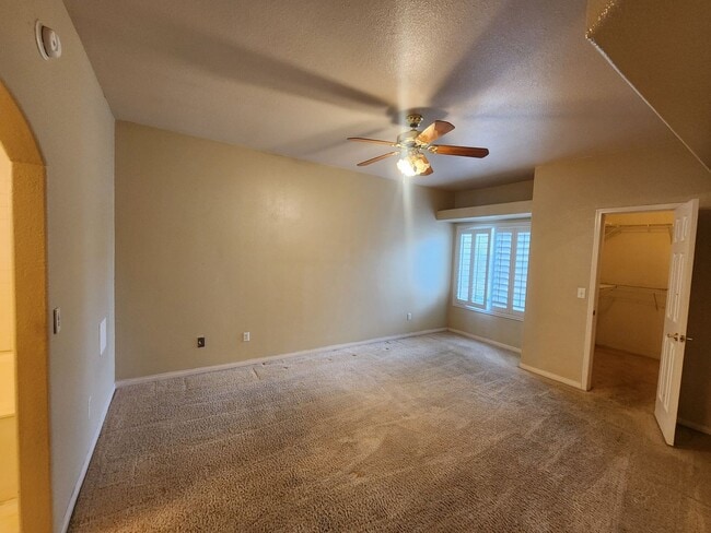 Building Photo - 2nd Story Condo in gated community close to the pool.