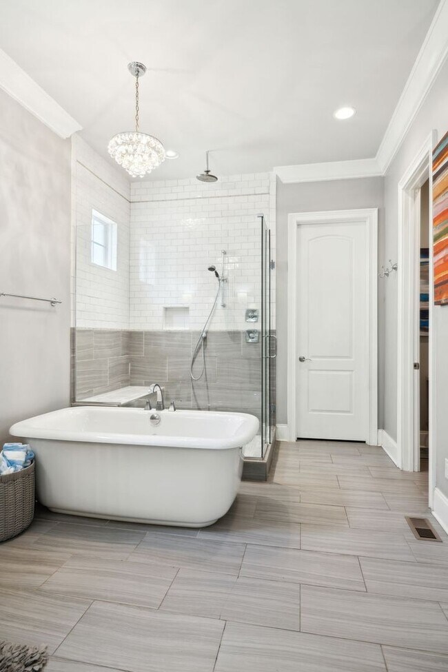 Building Photo - Welcome to this beautifully designed 4-bed...