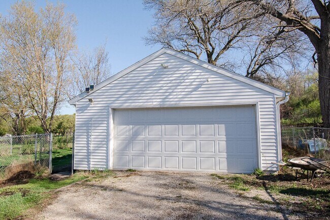 Building Photo - Fenced Yard, 2-Car Garage + Internet Included