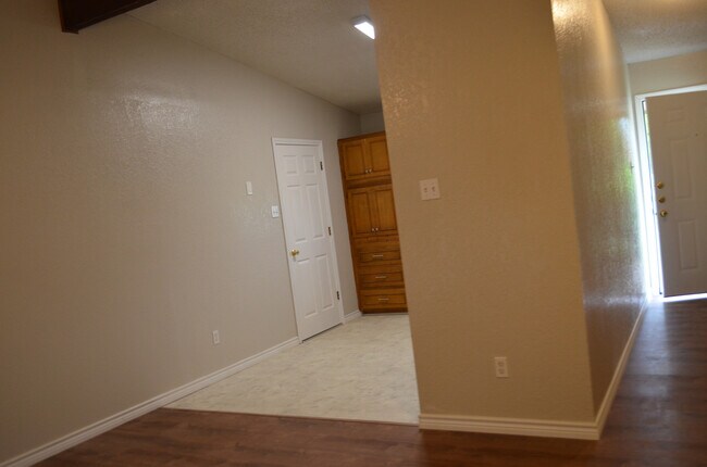 Building Photo - This 3 Bedroom Home with Fireplace is a must see!
