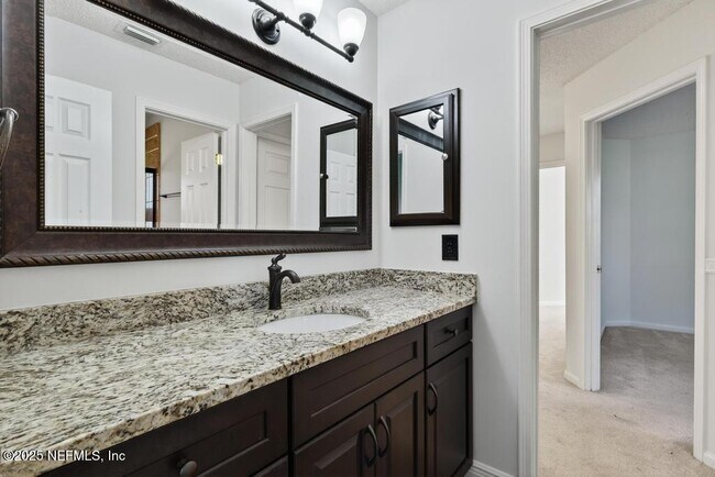 Building Photo - 4851 Jaybird Cir N