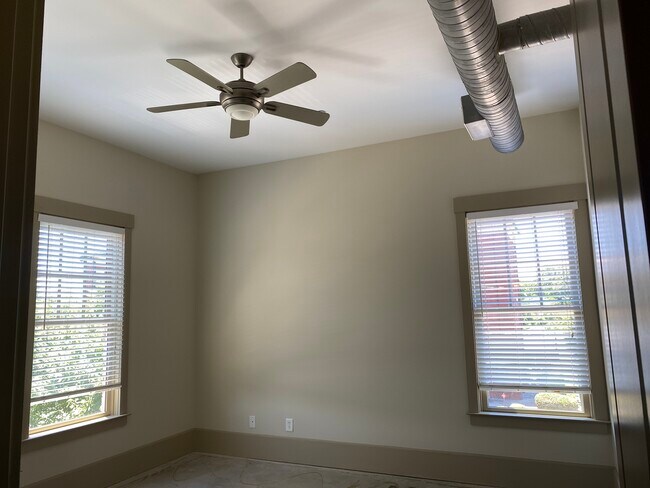 Exposed ductwork and ceiling fans - 125 Tribble Gap Rd