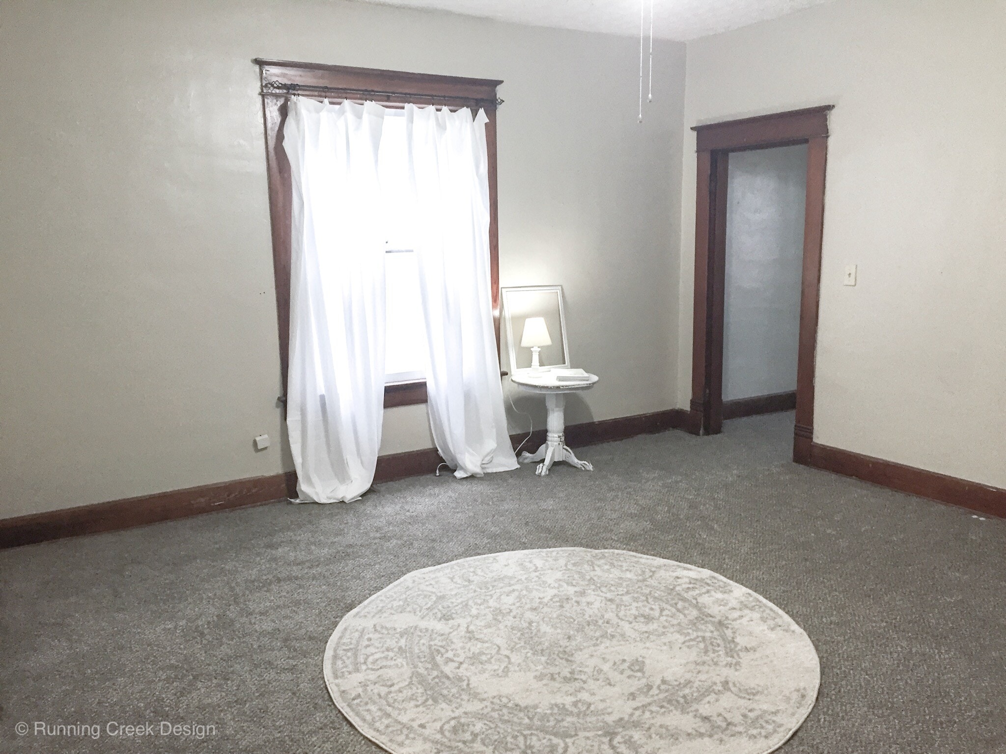 Enormous living room with a huge picture window. - 328 E Walnut Street