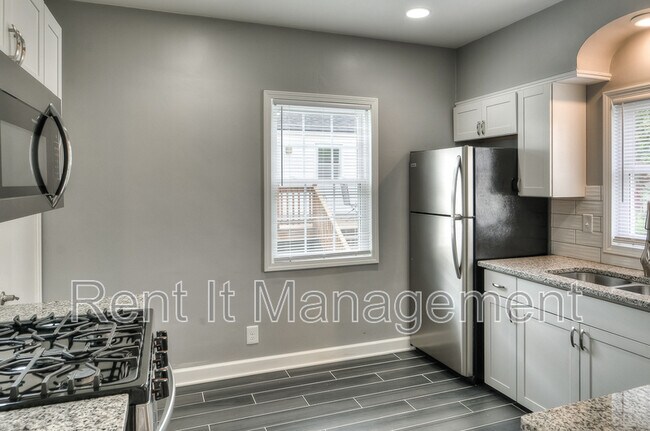 Building Photo - 6029 Poppleton Ave
