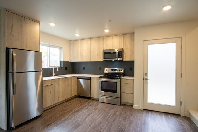 Building Photo - Stylish + Modern Corner 2-Bedroom Townhouse!