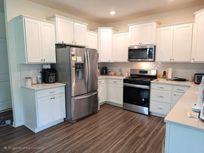 Building Photo - Centrally located, brand new 3-bedroom, 2....