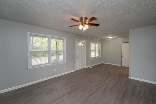 Building Photo - Freshly Updated 3BR with New LVP Flooring, Energy-Efficient Windows & Spacious Fenced Backyard