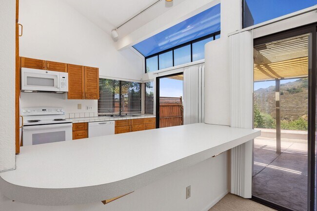 Building Photo - Private Back Yard with Expansive View of Tecolote Canyon!