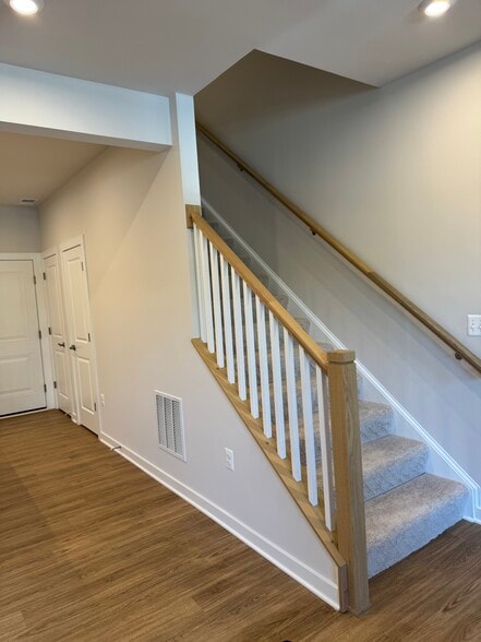 stairs and garage door in the back - 13622 Innovation Station Loop