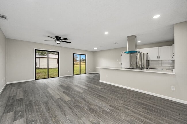 Building Photo - Charming Palm Bay Retreat - Perfect for Relaxation and Entertainment!