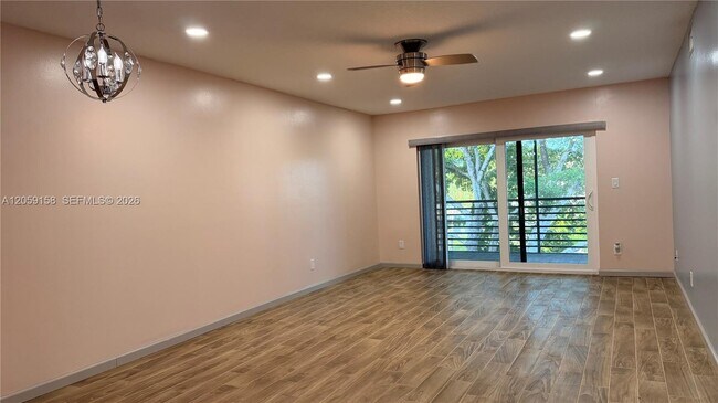 Building Photo - 6090 N Sabal Palm Blvd