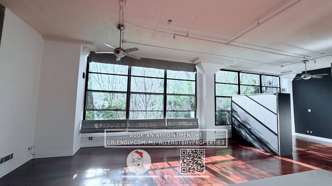 Building Photo - Sunny loft with in unit gym, heated floors in bathroom, contemporary kitchen, and includes water/...