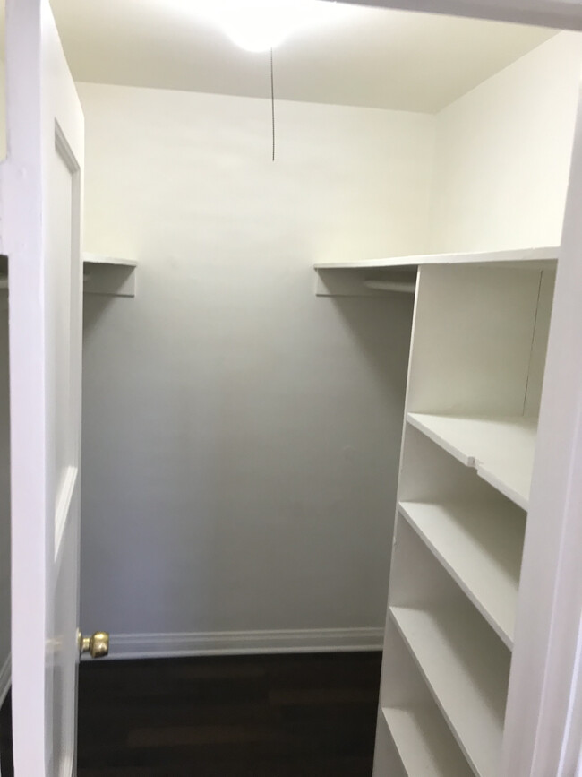 Large walk in closet with built in shelves - 2966 Hyperion Ave