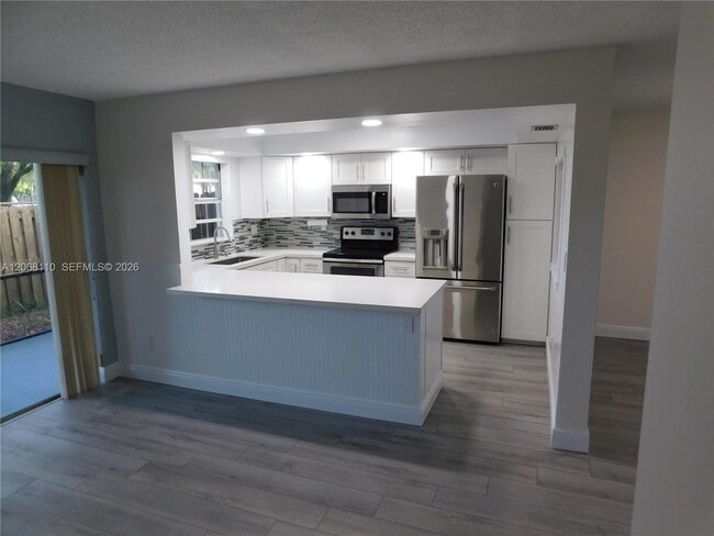 Building Photo - 12164 SW 52nd Pl