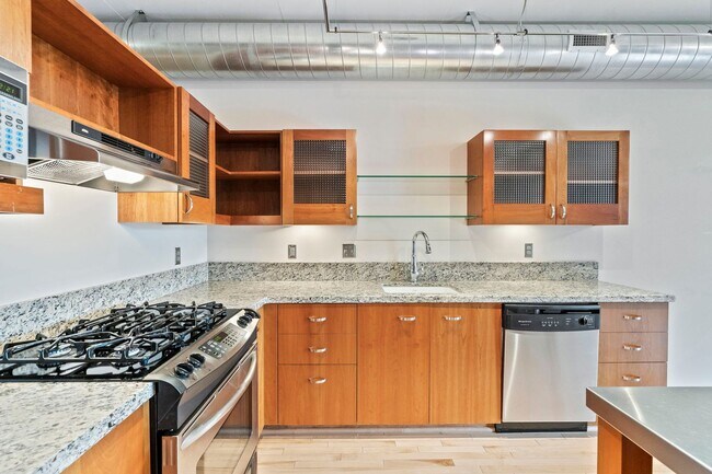 Building Photo - Elizabeth Lofts - 7th floor west facing Pearl District studio w/parking/concierge/most utilities