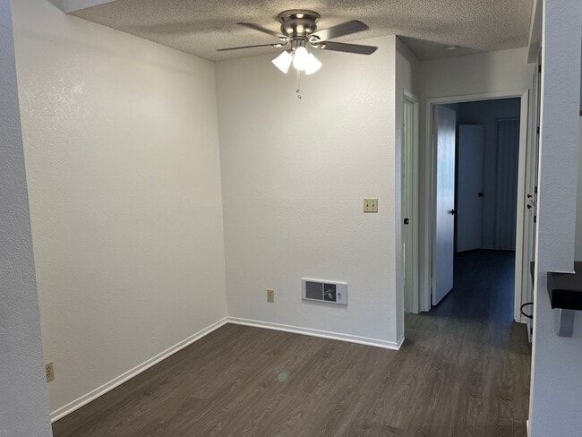 Building Photo - Cozy 2nd story apartment in the heart of City Heights.  Vaulted ceilings, fireplace, onsite laundry