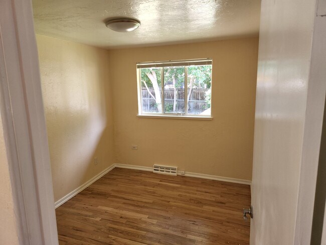 Building Photo - 8779 W 63rd Pl