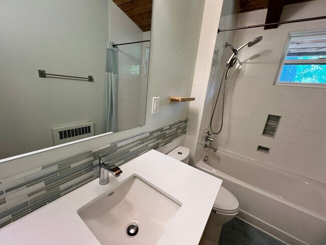 Building Photo - SPACIOUS FOUR BEDROOM TWO AND HALF BATH CH...