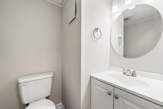Building Photo - Introducing a Charming End Unit Townhouse ...