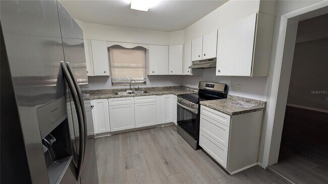 Building Photo - 1408 NE 25th Pl