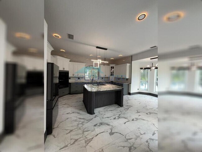 Building Photo - 8131 Vineland Oaks Blvd