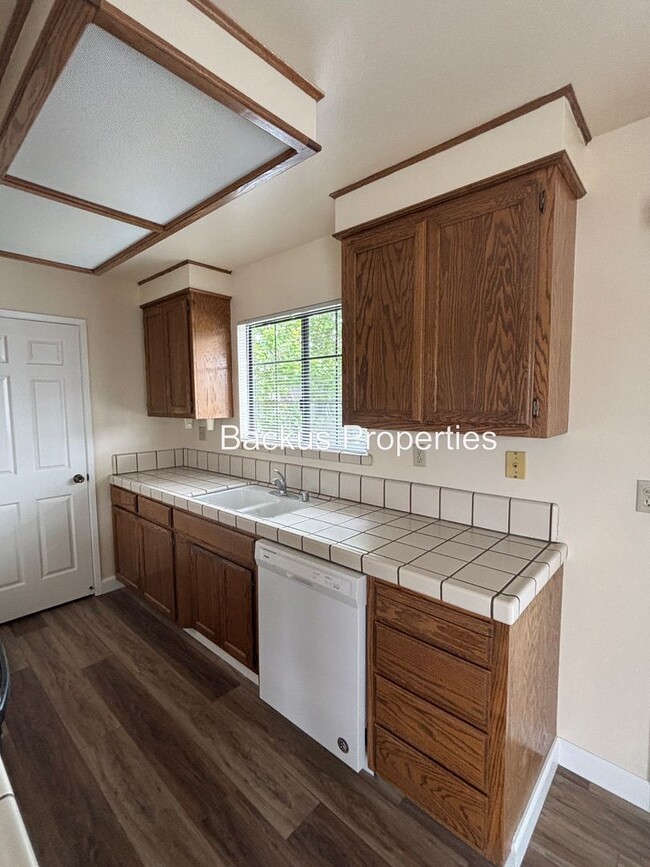 Building Photo - Very nice upstairs two bedroom condo in We...