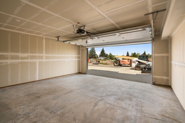 Building Photo - Pet Friendly! Gorgeous 3 Bedroom condo with double stall attached garages with AC.