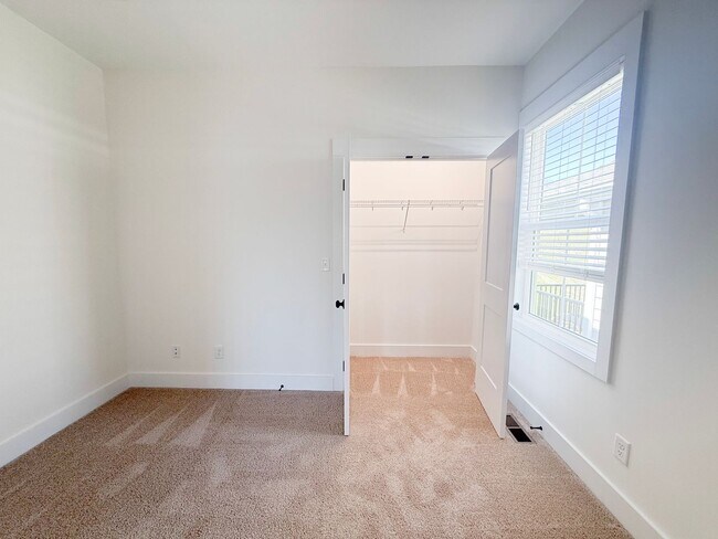 Building Photo - Tristan Style 3-Bedroom w/ Flex Room + Summer Special