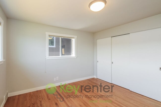 Building Photo - Waterfront Elegance with Private Dock and Designer Finishes